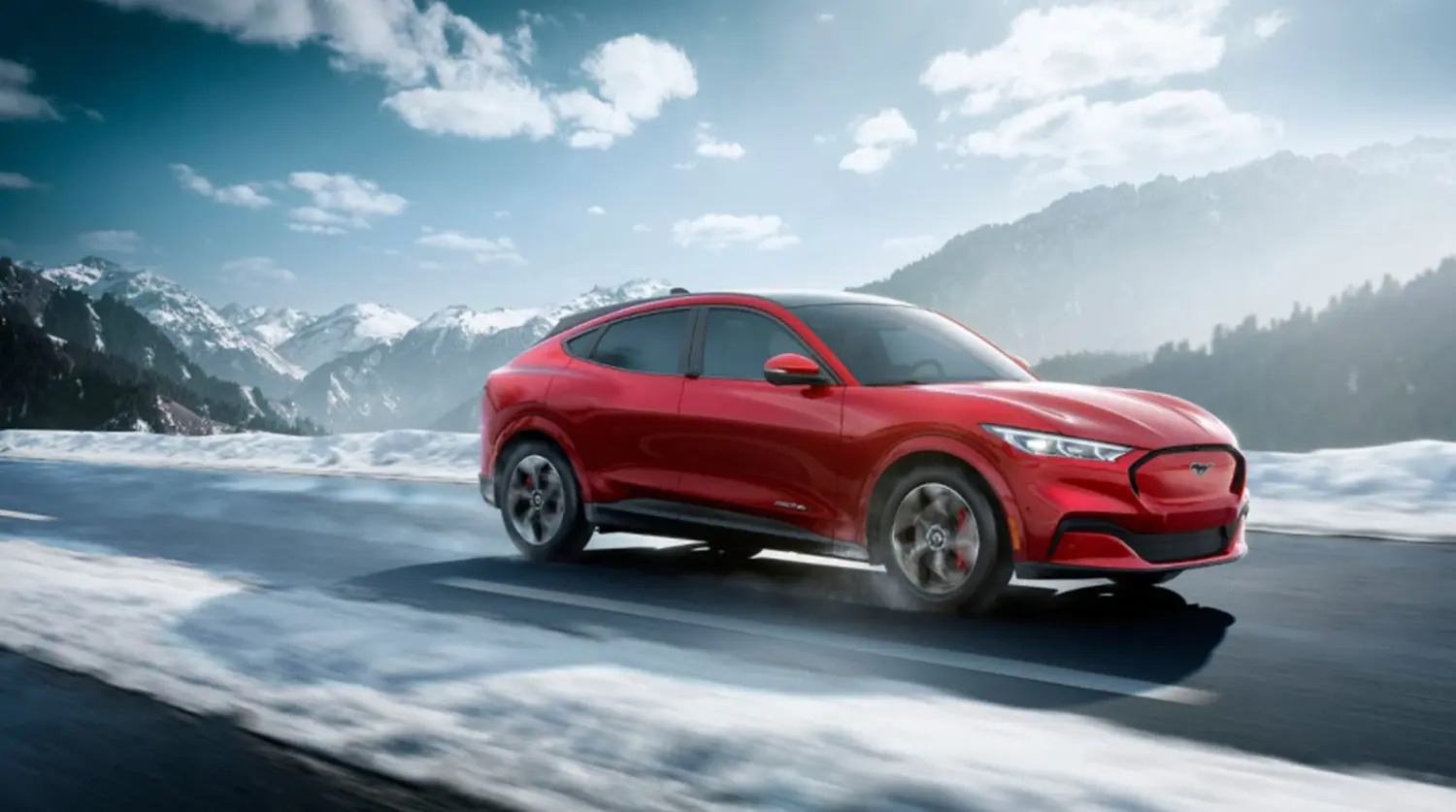 Mustang being driven in snow