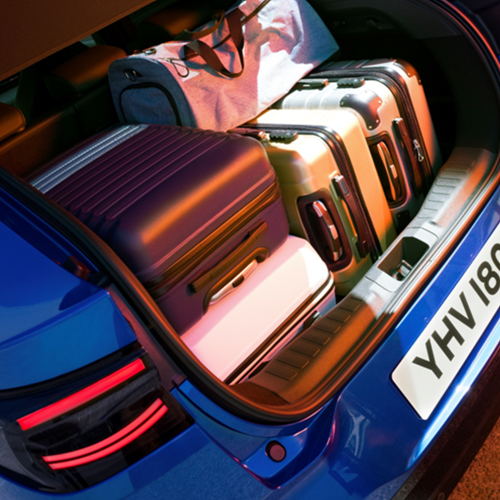 Large boot full of suitcases