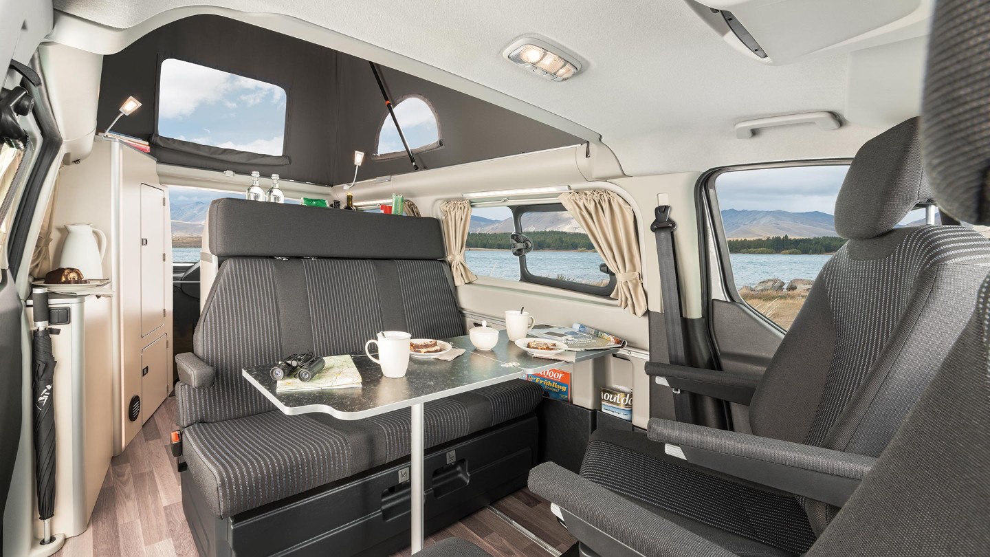 table with seats both sides 