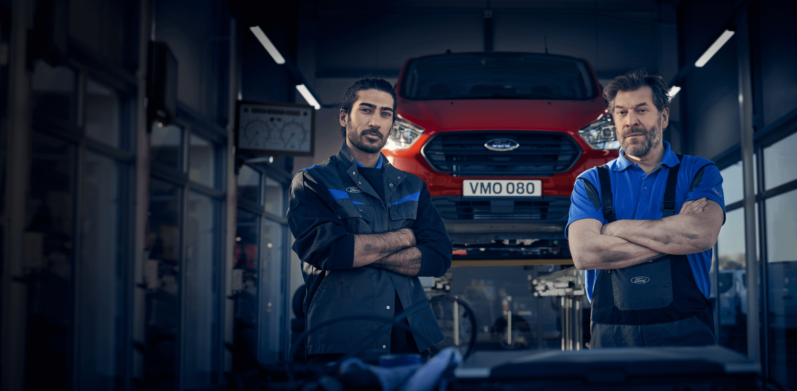 Ford mechanics with arms crossed